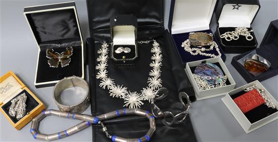 A collection of assorted silver jewellery including bracelets, earrings, necklaces, pendants etc.